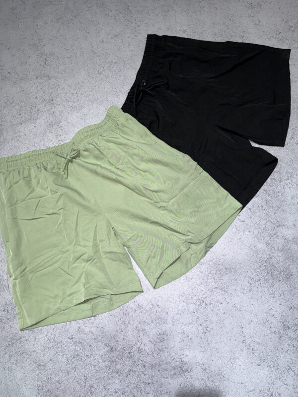 Short de baño con cierre en bolsillos